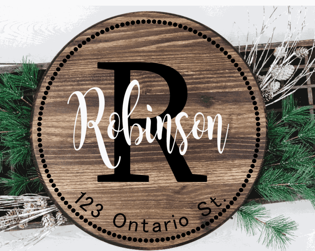 Custom family wood door sign with address and initial, featuring personalized design on knotty pine.