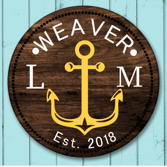 Custom family wood door sign with anchor design, personalized with last name and initials, suitable for housewarming or wedding gifts.