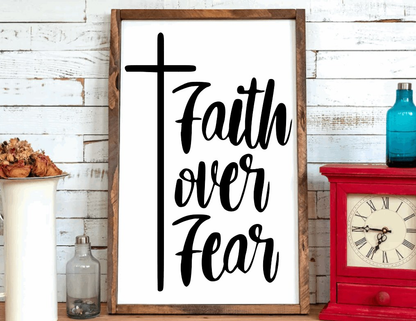 Rustic wood sign with 'Faith over Fear' text, cross motif, and stained frame.