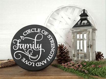 Round wooden family door sign with "A Circle of Strength and Love" text, handcrafted from solid knotty pine, ideal for indoor or outdoor decor.
