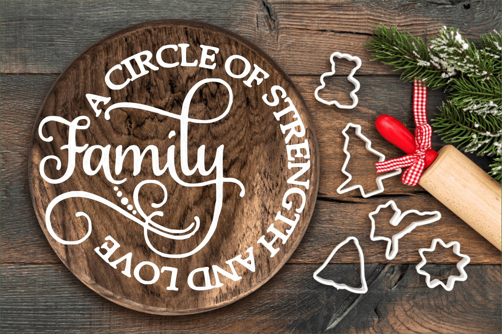 Handcrafted wooden family door sign with decorative text "A Circle of Strength and Love" surrounded by baking items and greenery.