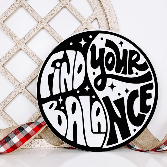 Round wooden "Find Your Balance" sign with yin-yang design, perfect for home decor.