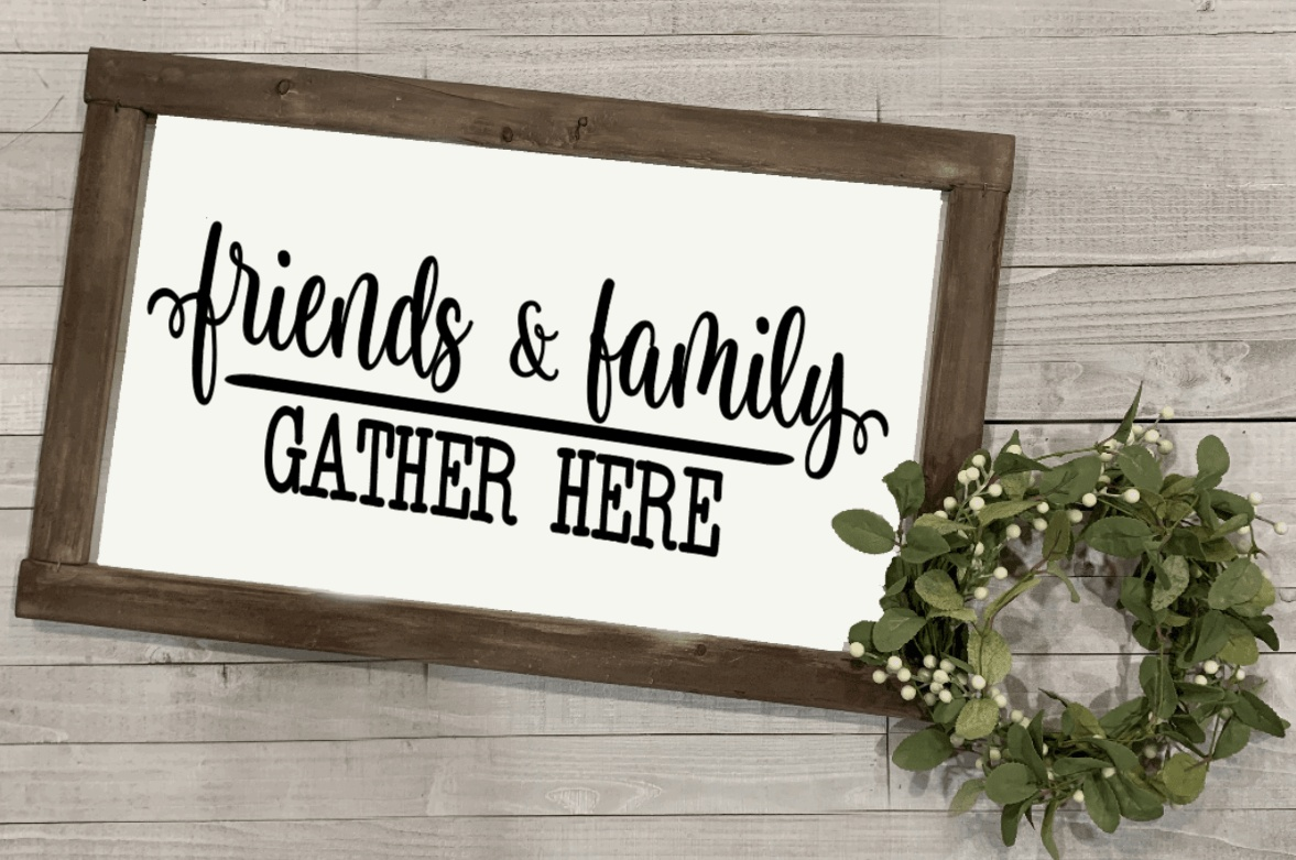 Handcrafted wood sign with "Friends & Family Gather Here" text, framed and ready to hang.