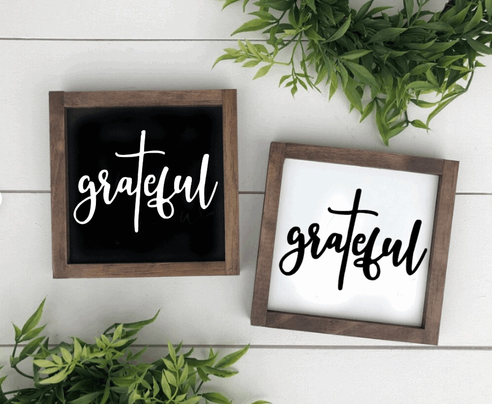 Handmade wood sign with "grateful" text in black and white backgrounds, rustic style.