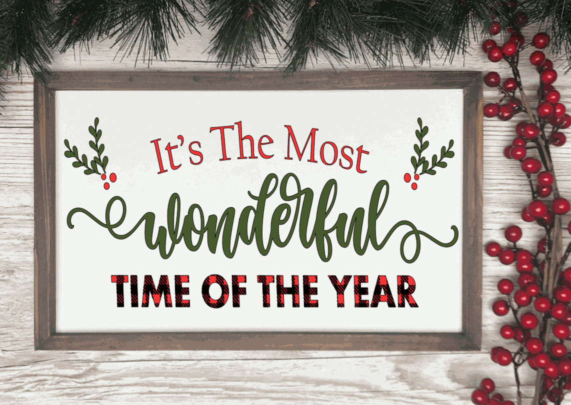 Handmade wood sign with festive lettering saying "It's the Most Wonderful Time of the Year," perfect for Christmas decor.