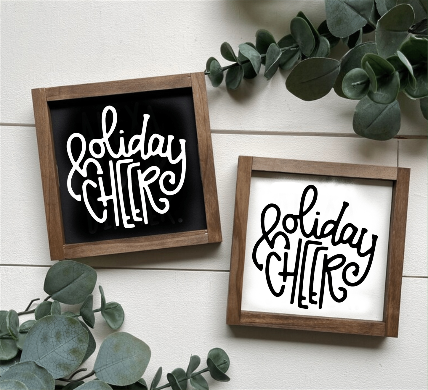 Handcrafted wood "Holiday Cheer" Christmas signs in rustic frames, available in black or white backgrounds, perfect for holiday decor.