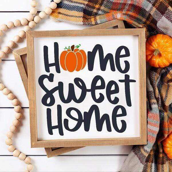 Wood Thanksgiving Sign with "Home Sweet Home", white background, black and orange lettering, made of pine wood.