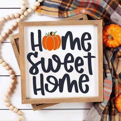 Wood Thanksgiving Sign with "Home Sweet Home", white background, black and orange lettering, made of pine wood.