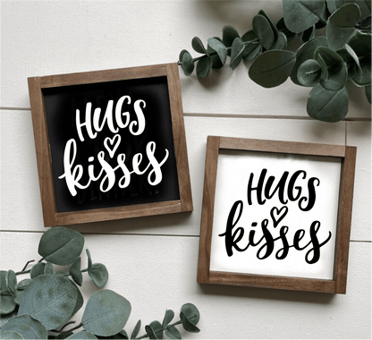 Hugs and Kisses handcrafted wood sign with black and white backgrounds, framed for wall decor.