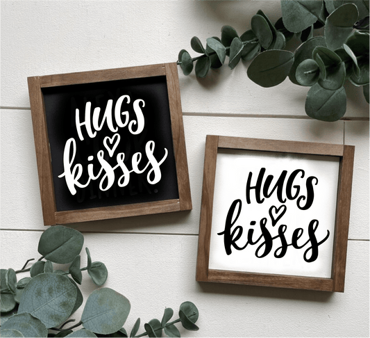Hugs and Kisses handcrafted wood sign with black and white backgrounds, framed for wall decor.
