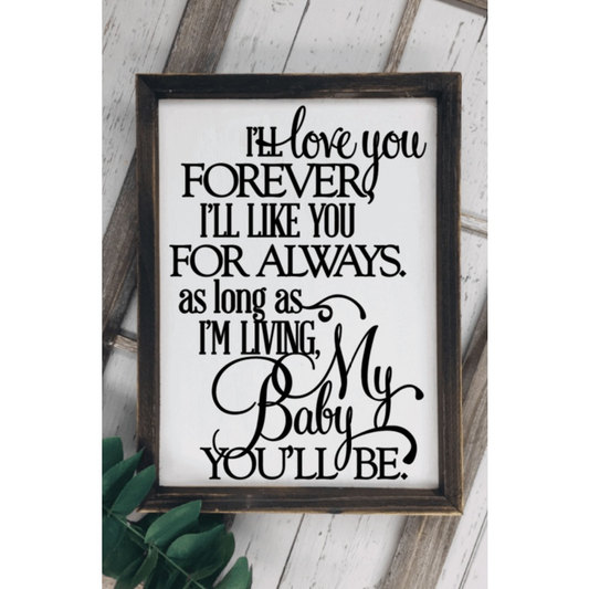 Handcrafted wood sign with "I'll Love You Forever" quote, black lettering on white background, framed for baby or child's room décor.