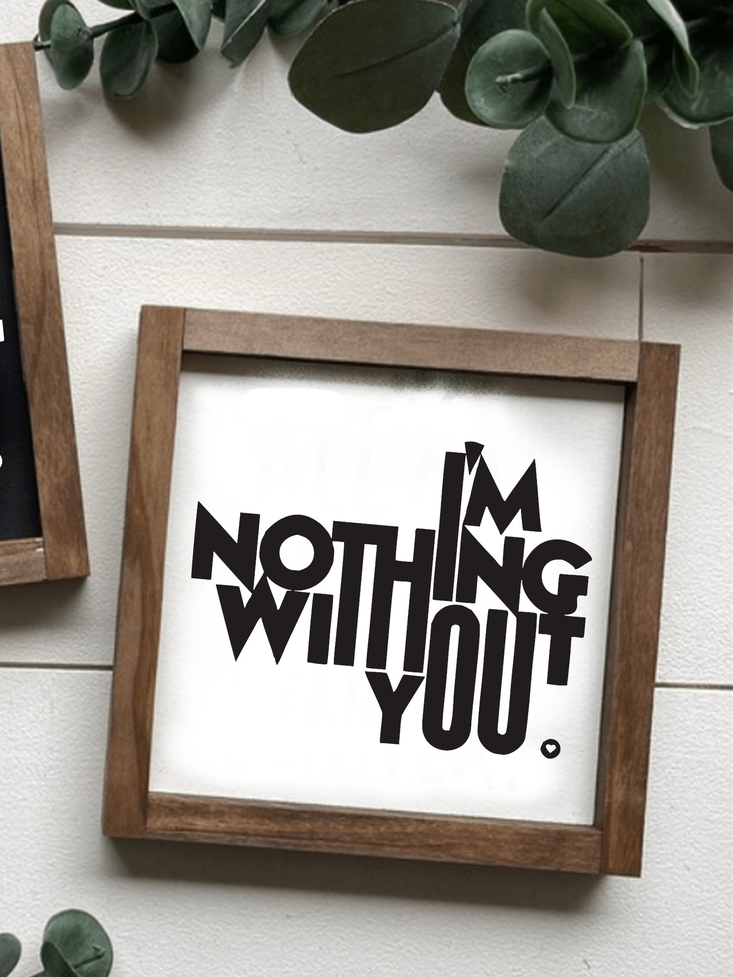 Handcrafted "I'm Nothing Without You" wood sign with black lettering on a white background, framed and ready to hang. Perfect for gifts and home decor.