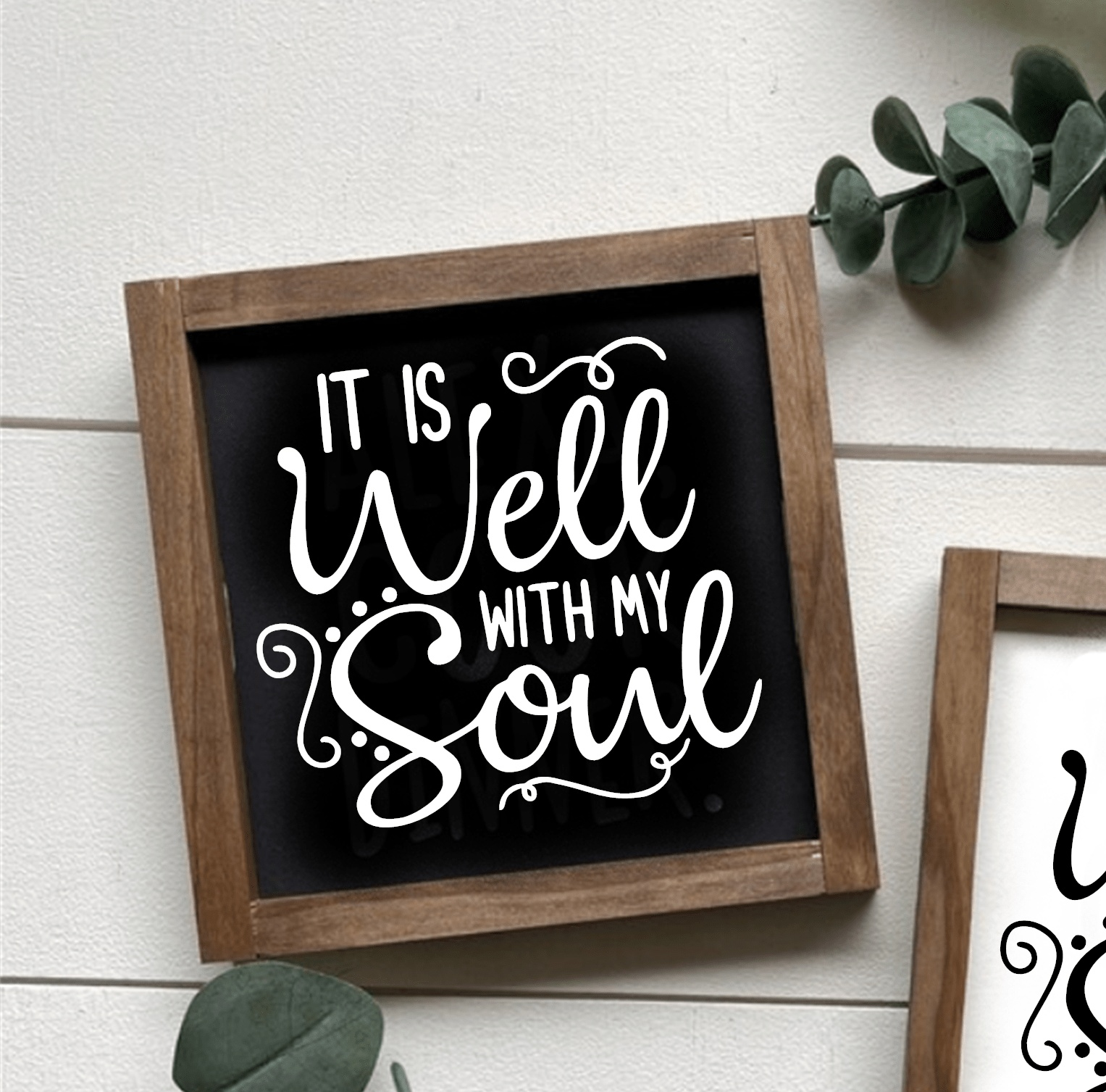Handcrafted wood sign with "It is Well with my Soul" text, black background, and white lettering, framed in wood.