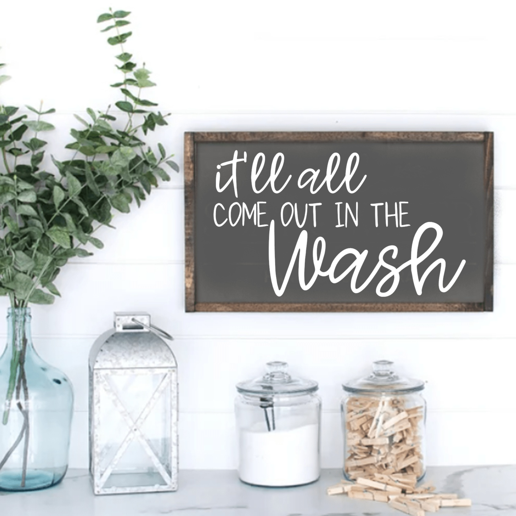 Rustic framed wood sign with "It'll all Come Out in the Wash" text, perfect for laundry room decor.