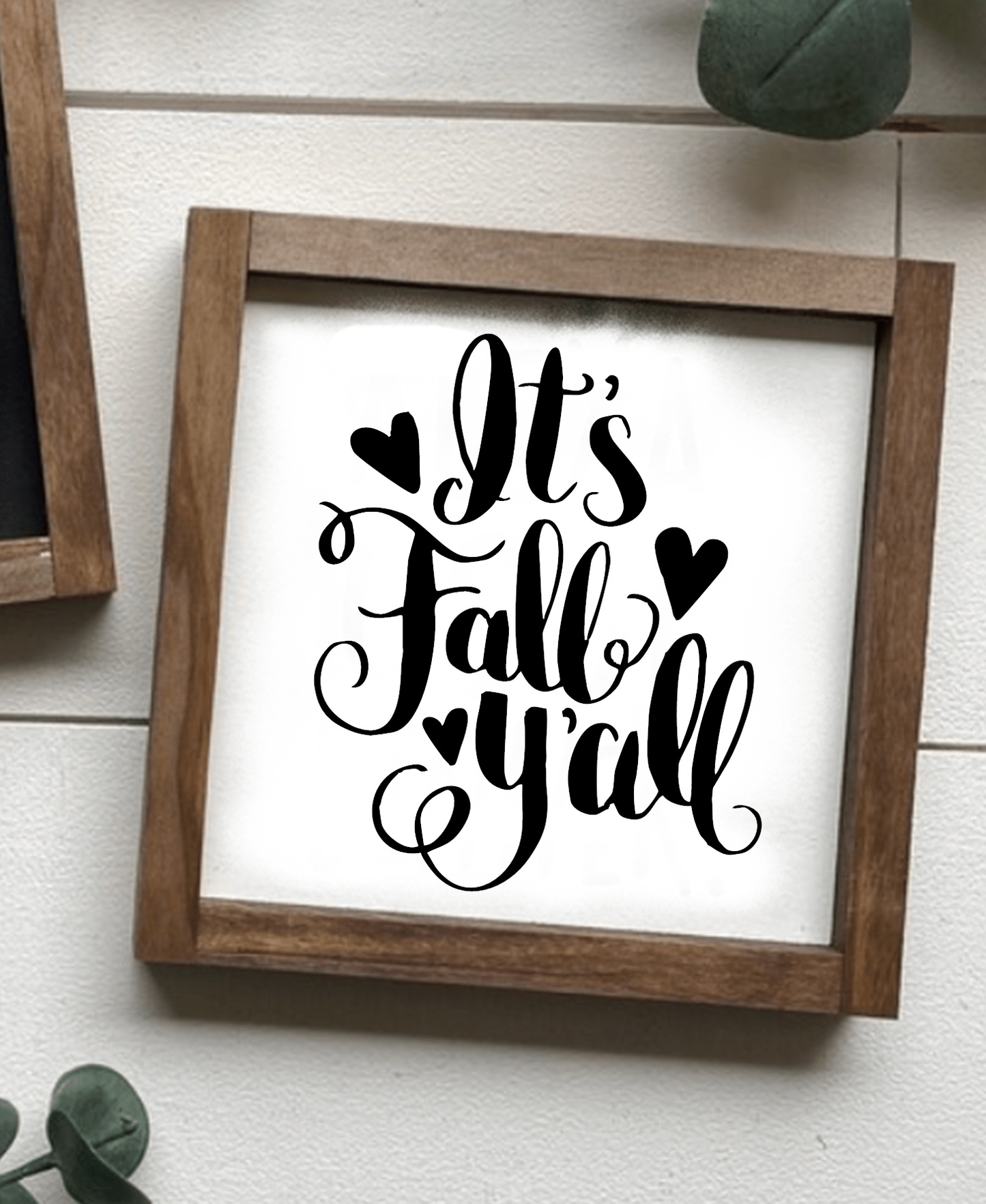 Handcrafted "It's Fall Y'all" sign with wooden frame, white background, and black lettering. Perfect autumn home decor.