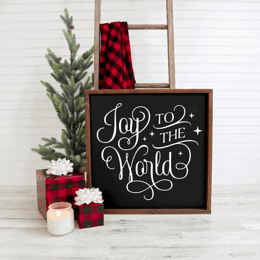 Handmade wood framed "Joy to the World" festive sign with black background and white lettering, perfect for mantle or wall display.