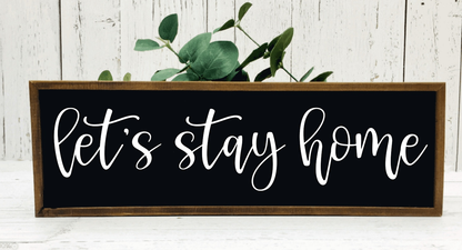 Handmade "Let's Stay Home" rustic wood sign, black background with white lettering, 9x30 inches, stained frame.