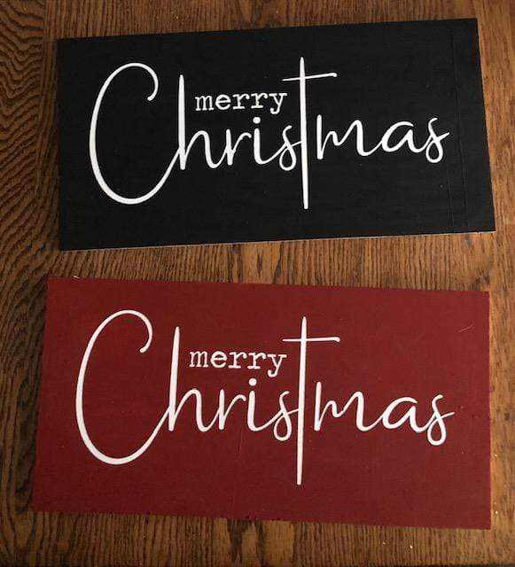 Handmade Merry Christmas wood signs with script design, available in black or red backgrounds.