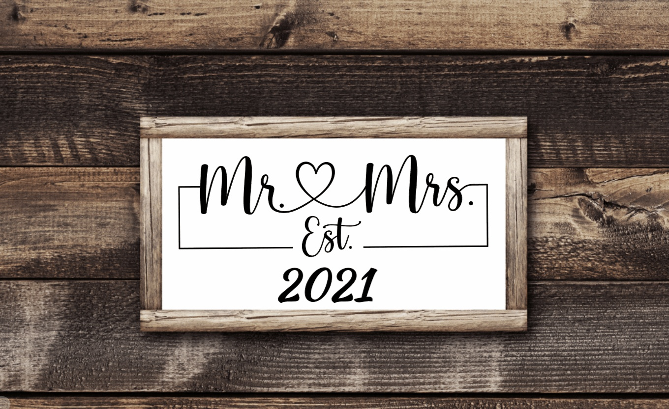 Mr and Mrs wooden wedding sign with rustic design and customizable options.