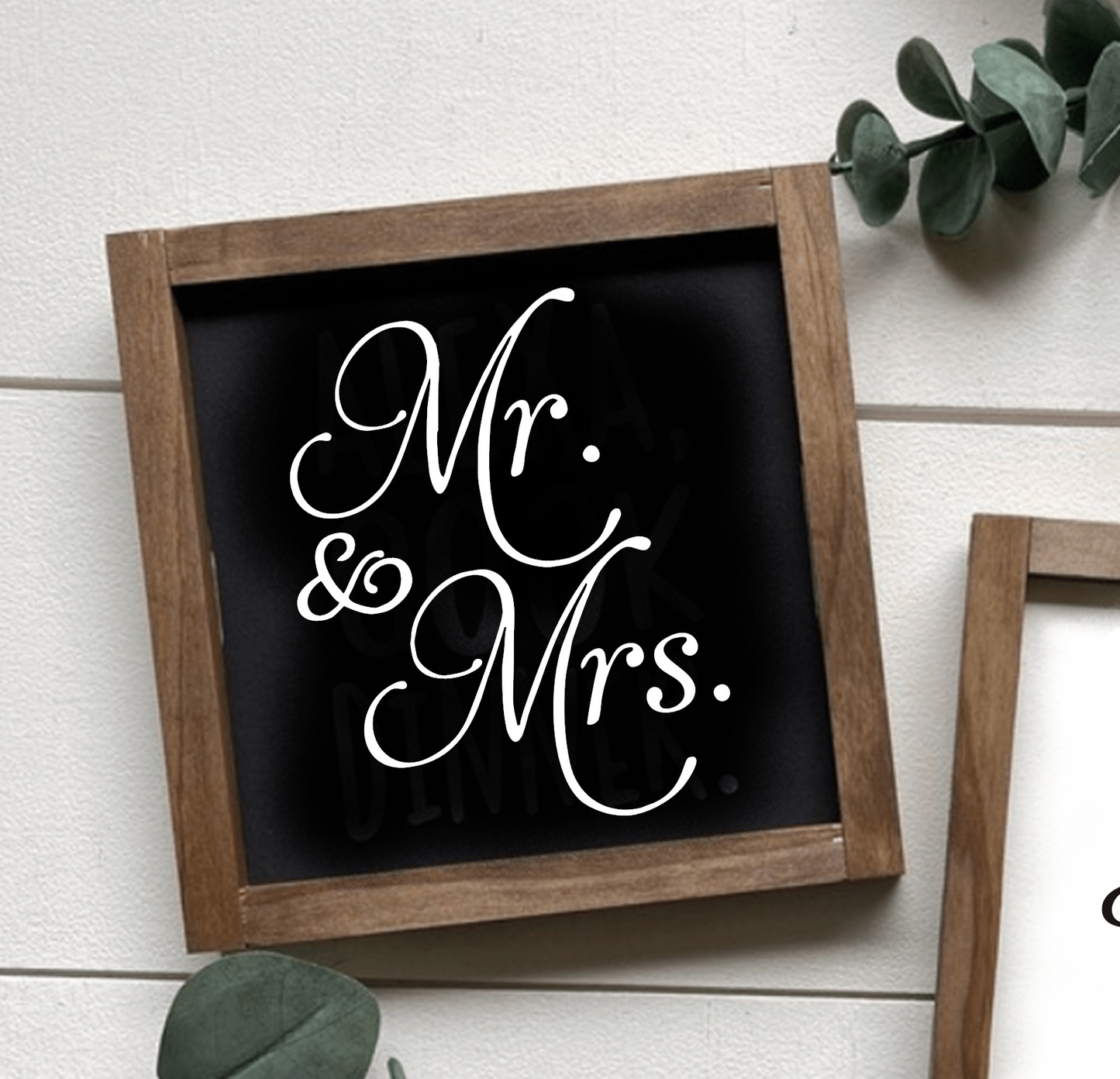 Handcrafted "Mr and Mrs" framed wood sign with black background and white lettering.