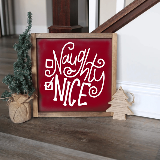 Handmade Naughty or Nice holiday wood sign with red background and white lettering, festive home decor.