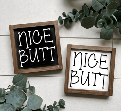 Handcrafted "Nice Butt" wood signs with black and white backgrounds, framed and uniquely designed for bathroom decor.