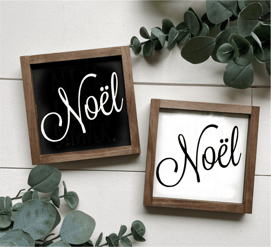 Handcrafted 'Noel' framed wood sign with black and white backgrounds, featuring black and white lettering, perfect for festive home decor.