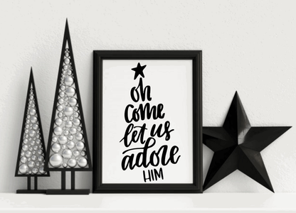 Christmas framed wood sign with "Oh Come Let Us Adore Him" text, black lettering on white background.