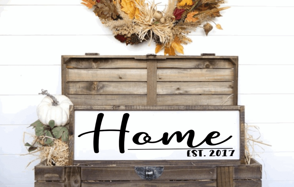 Rustic farmhouse wood sign with personalized "Home" design and customizable est. date, crafted from pine with stained frame.