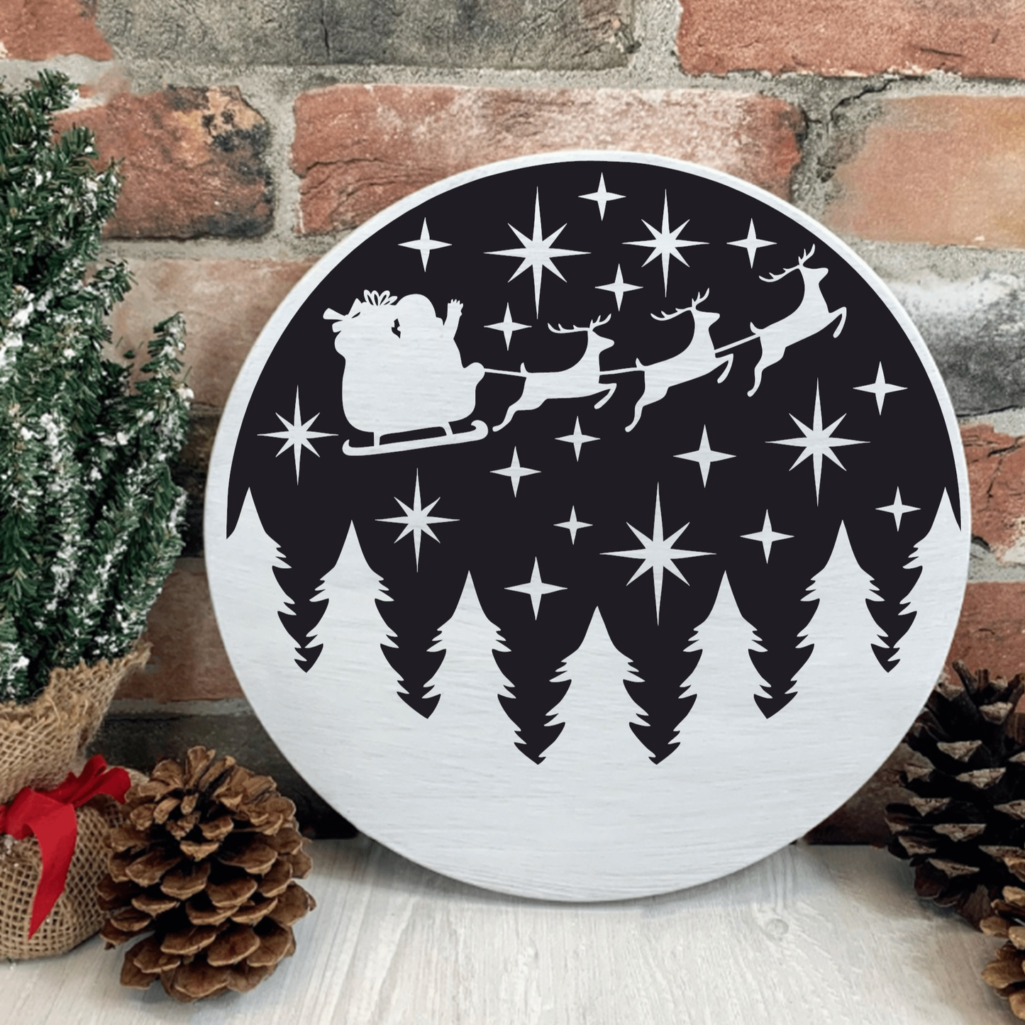 Handmade Santa and Sleigh wood sign with reindeer and trees, 12-inch round pine decor.