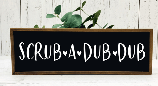 Handmade wood bathroom sign with "Scrub A Dub Dub" text on black background.