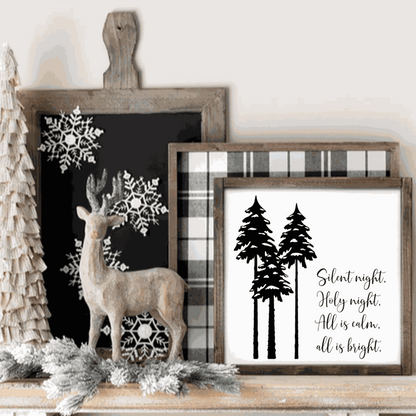 Framed "Silent Night, Holy Night" wood sign with tree design, perfect for holiday decor.