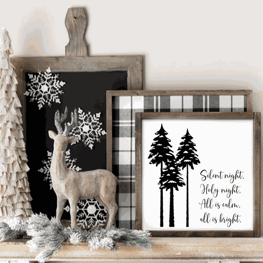 Framed "Silent Night, Holy Night" wood sign with tree design, perfect for holiday decor.