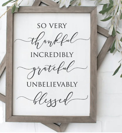 Rustic wood sign with "So Very Thankful Grateful Blessed" message, farmhouse style decor.