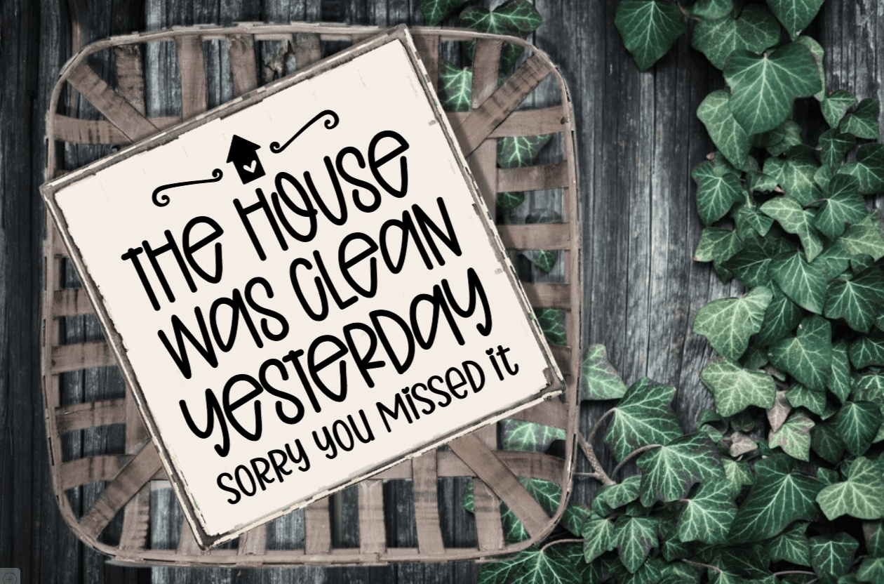 Handmade rustic wood sign with "The House was Clean Yesterday" quote, white background, black lettering.
