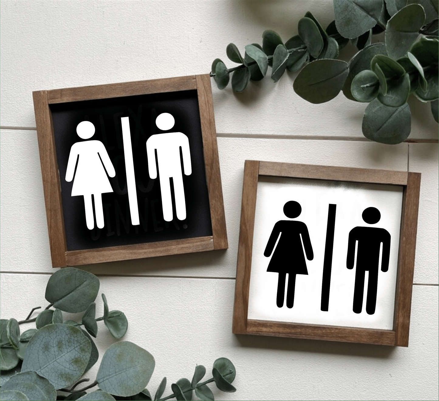 Unisex bathroom sign with framed wood, available in black or white backgrounds, perfect for modern or rustic decor.
