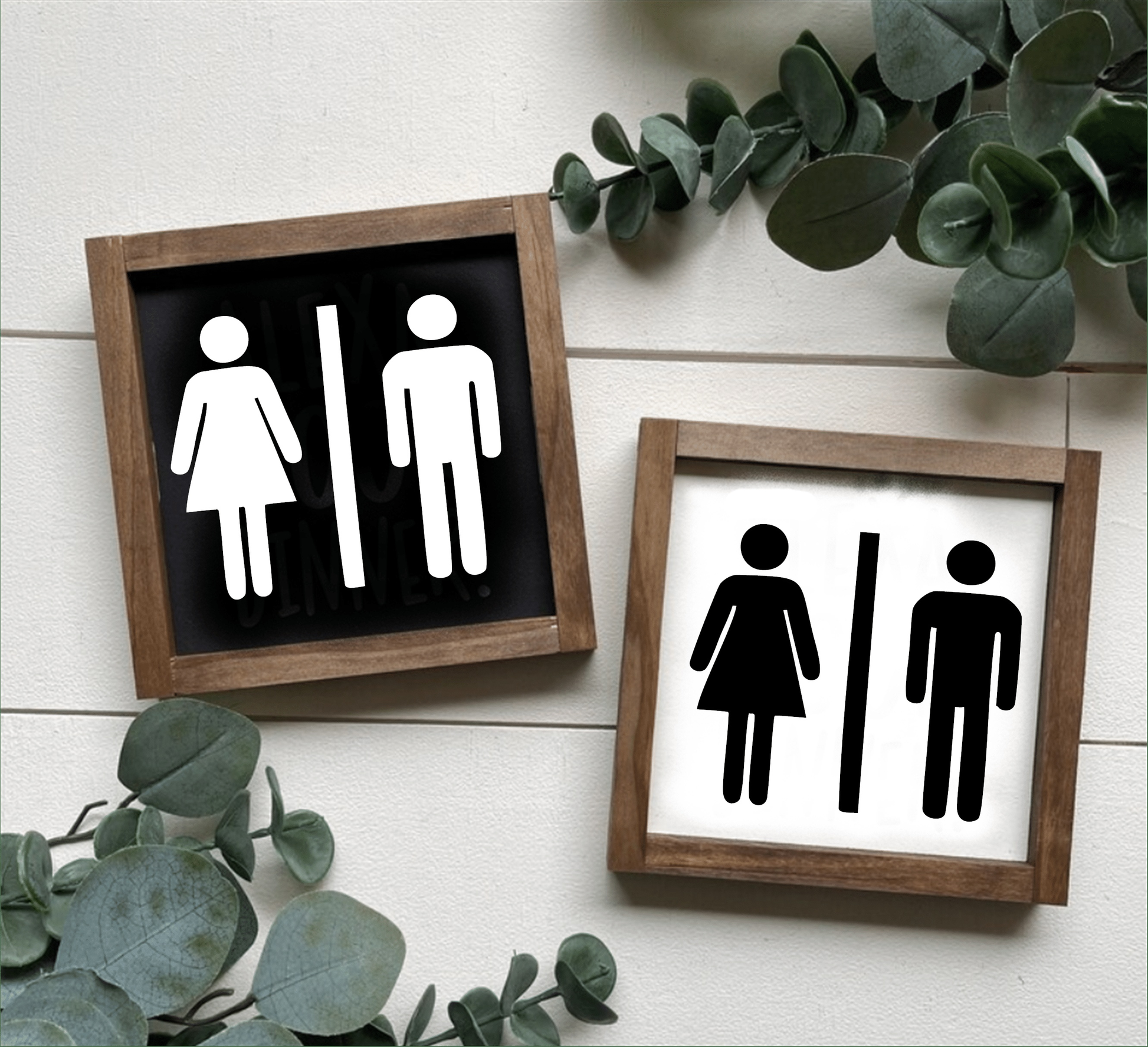 Unisex bathroom sign with framed wood, available in black or white backgrounds, perfect for modern or rustic decor.