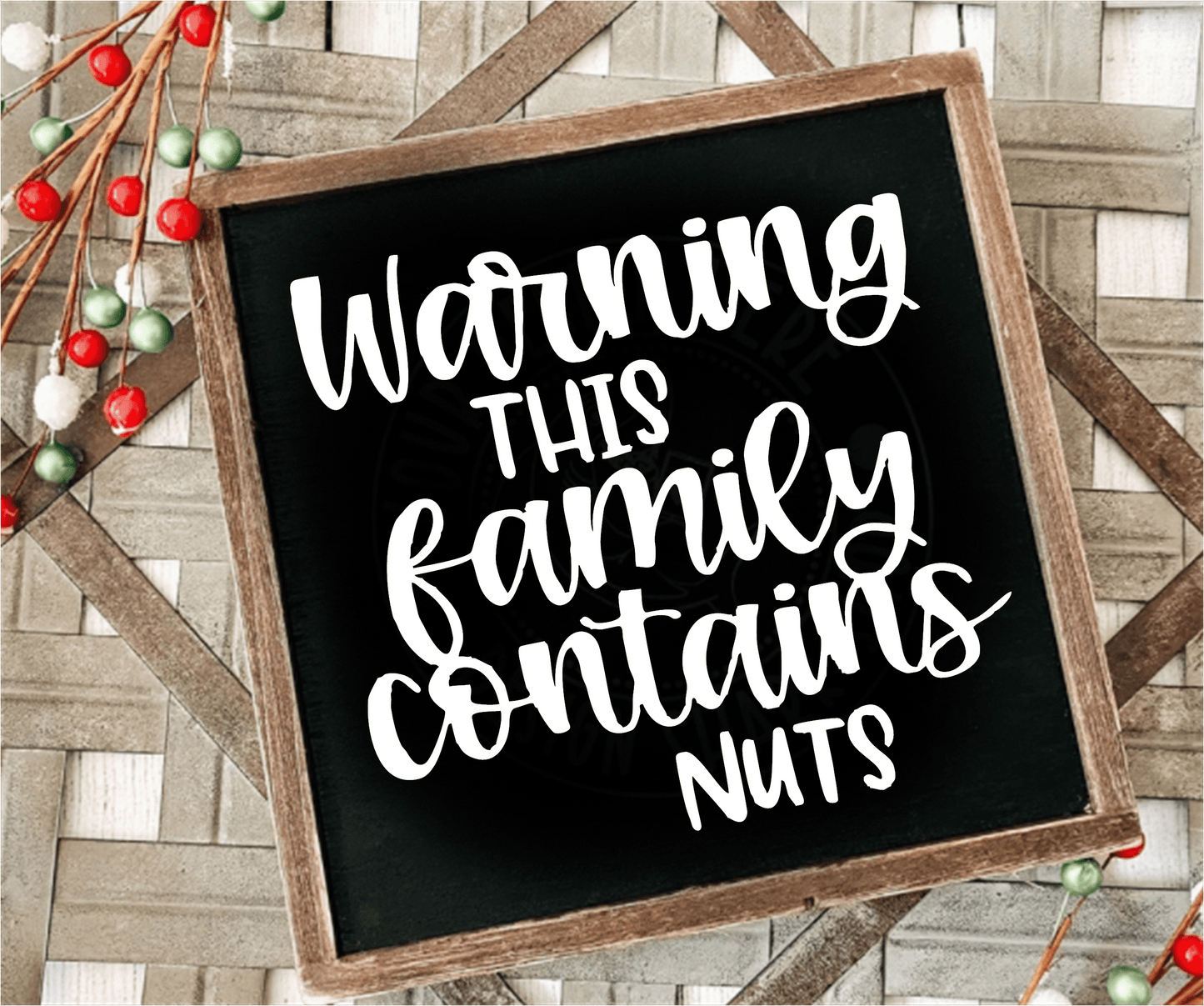 Handcrafted framed wood sign with "Warning This Family Contains Nuts" text on black background with white lettering.