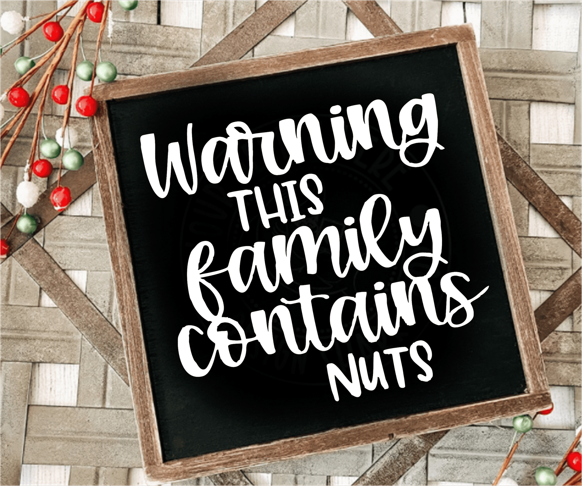 Handcrafted framed wood sign with "Warning This Family Contains Nuts" text on black background with white lettering.
