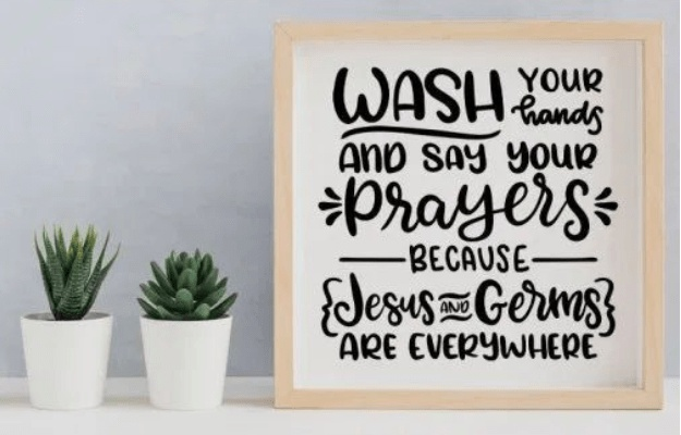 Framed wood sign with "Wash Your Hands and Say Your Prayers" text, white background, customizable pine wood frame.