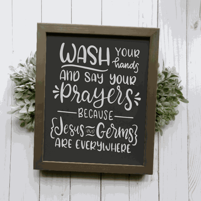 Framed wood sign with "Wash Your Hands and Say Your Prayers" message, black lettering on white background, customizable stain, for bathroom decor.