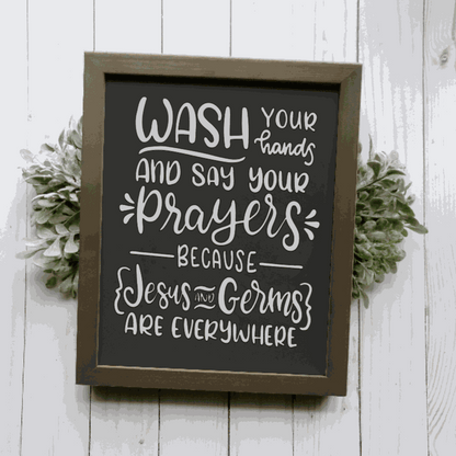 Framed wood sign with "Wash Your Hands and Say Your Prayers" message, black lettering on white background, customizable stain, for bathroom decor.