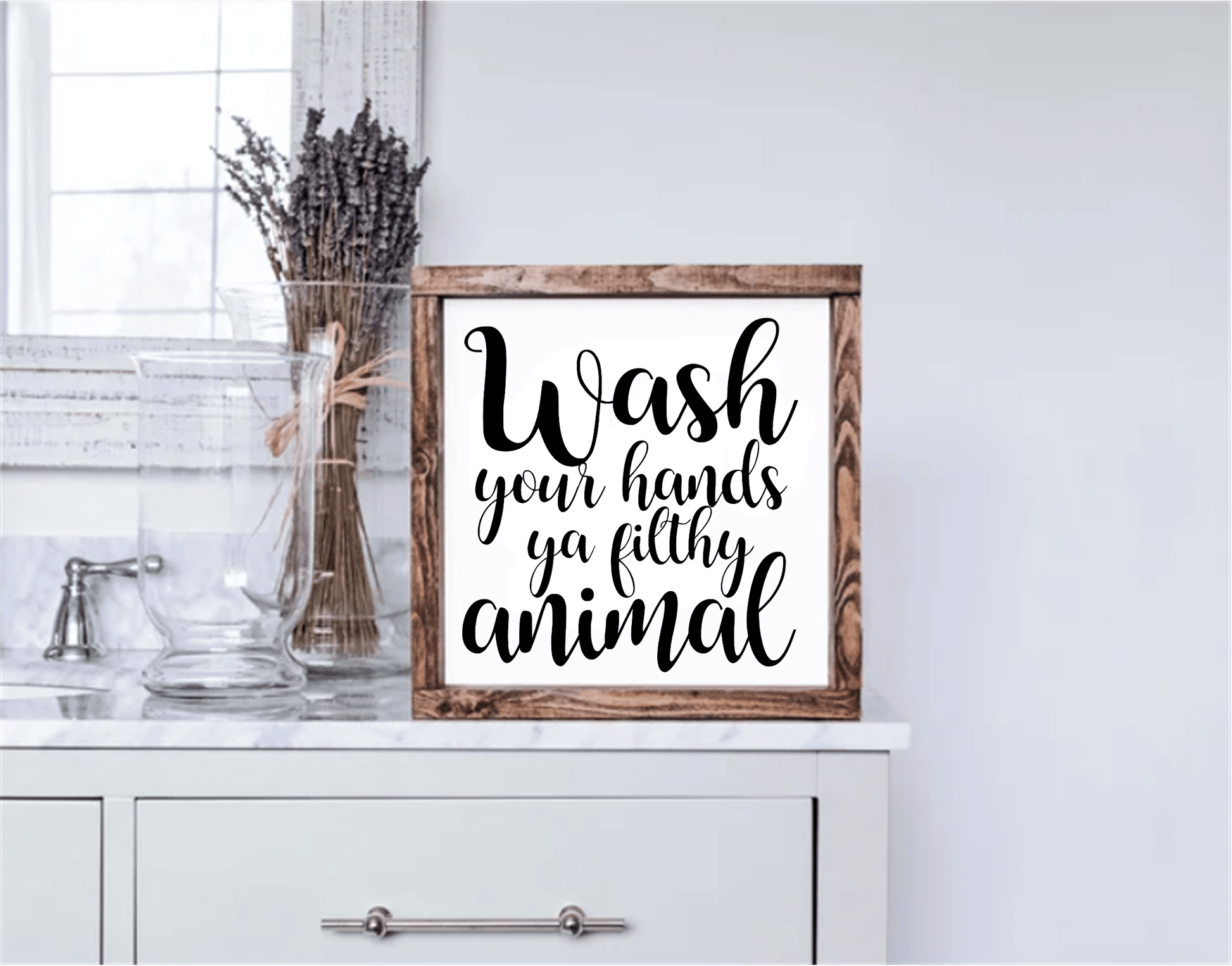 Funny "Wash Your Hands Ya Filthy Animal" framed wood sign in a bathroom setting.