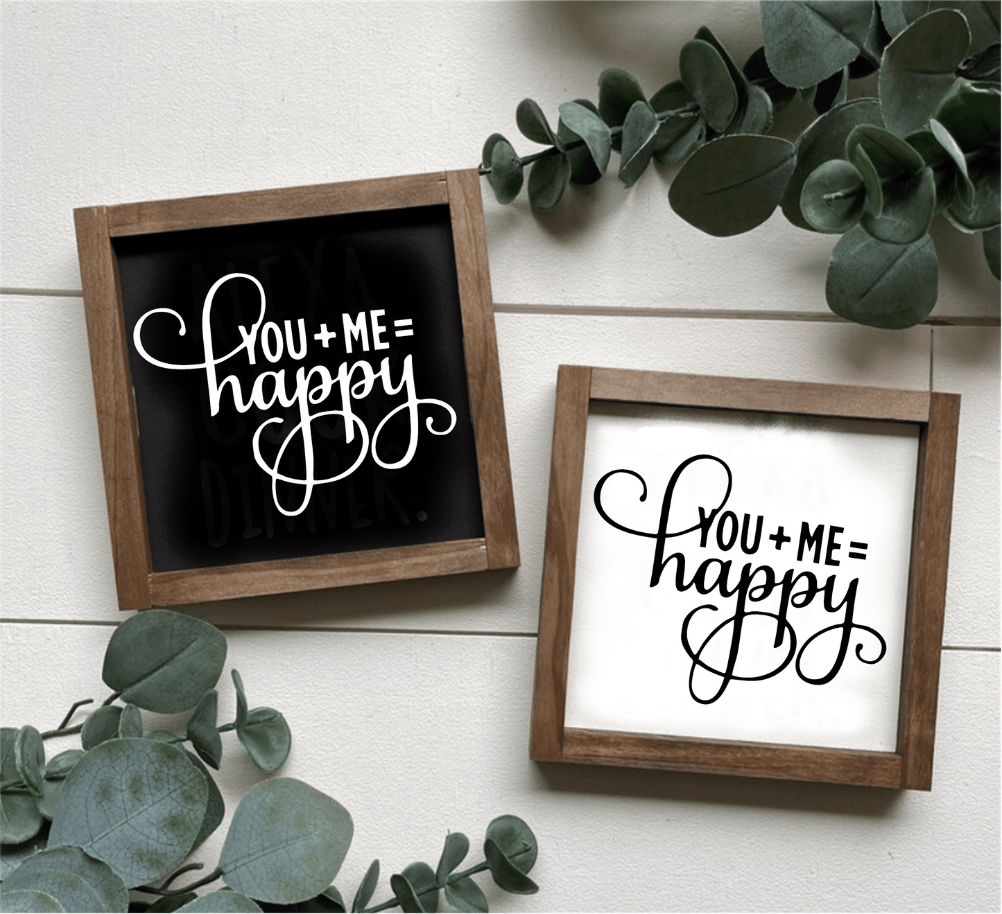 Handcrafted "You Plus Me Equals Happy" wood sign with black and white options, framed and decorated with greenery.