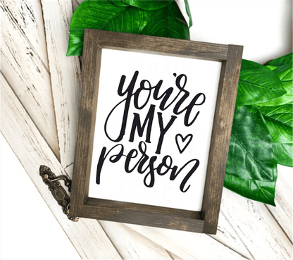 Handmade "You're My Person" wood sign with stained pine frame, white background, and black lettering.