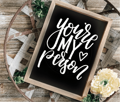 Handmade "You're My Person" wood sign with a stained pine frame, black background, white lettering, and floral accents.