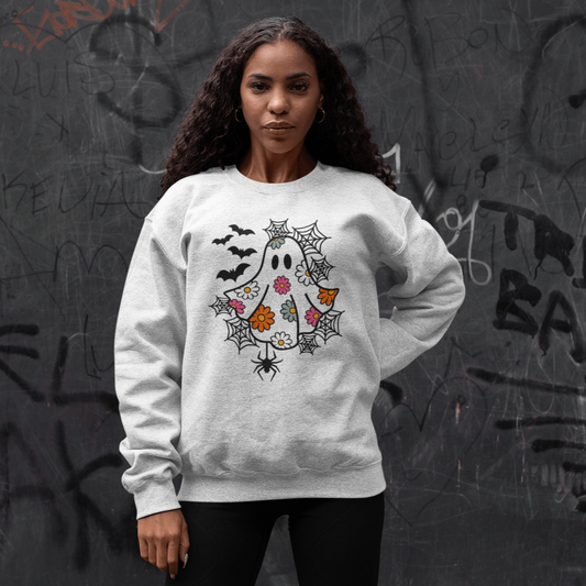 Women's Halloween ghost sweatshirt with floral and bat design.