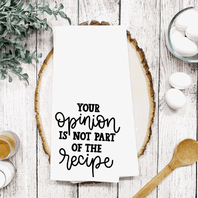 Decorative tea towel with "Your Opinion is not part of the Recipe" saying, perfect for gifting and everyday use.